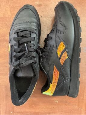 REEBOK Classic Black Leather Sneakers with Orange/Iredescent Textured Accent
